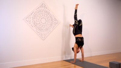 Drinie Aguilar Yoga Collective Wall to Handstand
